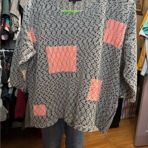 Patterned Black and White Sweater with Pink Accents